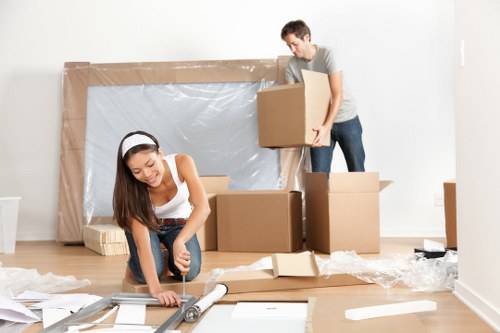 Moving team loading household furniture for a home move in Welling
