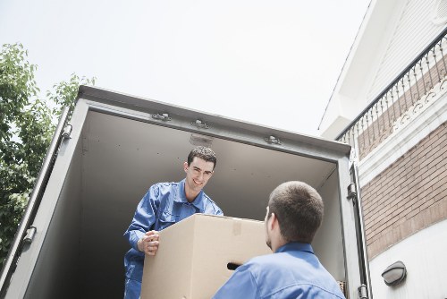 Moving team using protective equipment during a house move